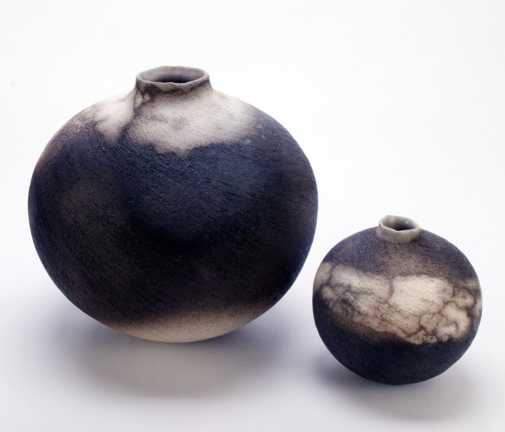 Moira Goodall - pair of textured moon jars